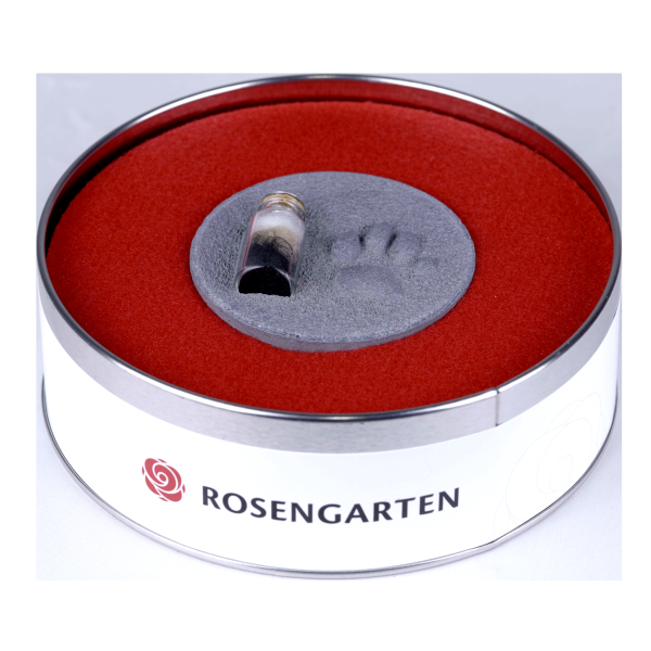 Pfotenabdruck aus Gips mit Fell in Metalldose, schwarz